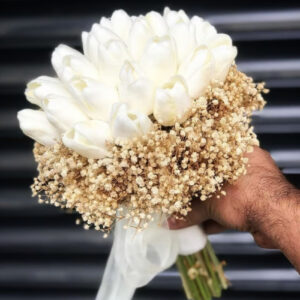 Artificial tulip flower bouquet and dried natural gypsophila.