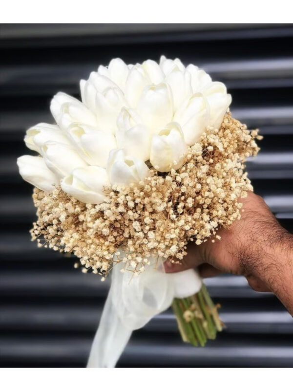 Artificial tulip flower bouquet and dried natural gypsophila.